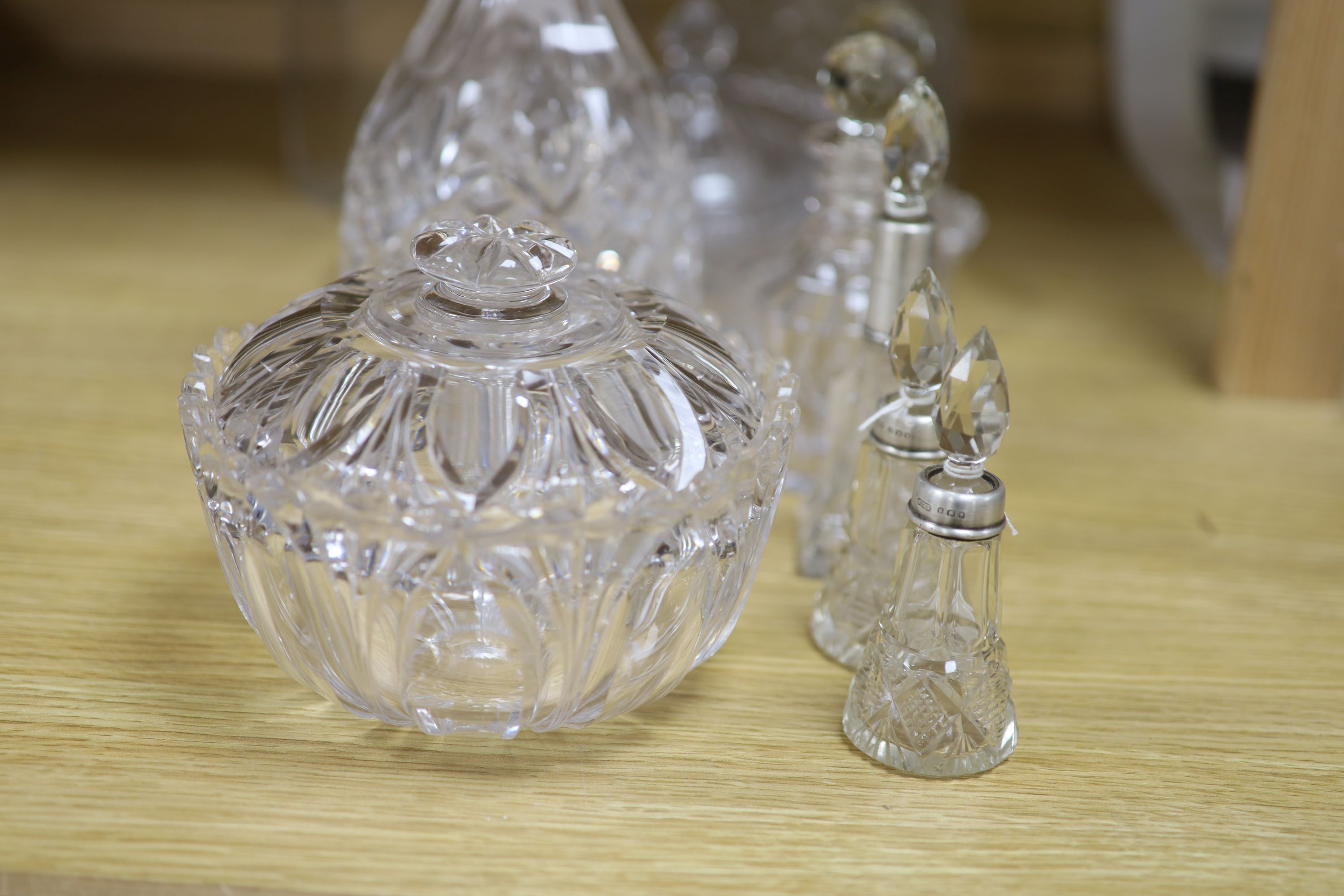 A pair of cut glass decanters, two others and mixed cut glass